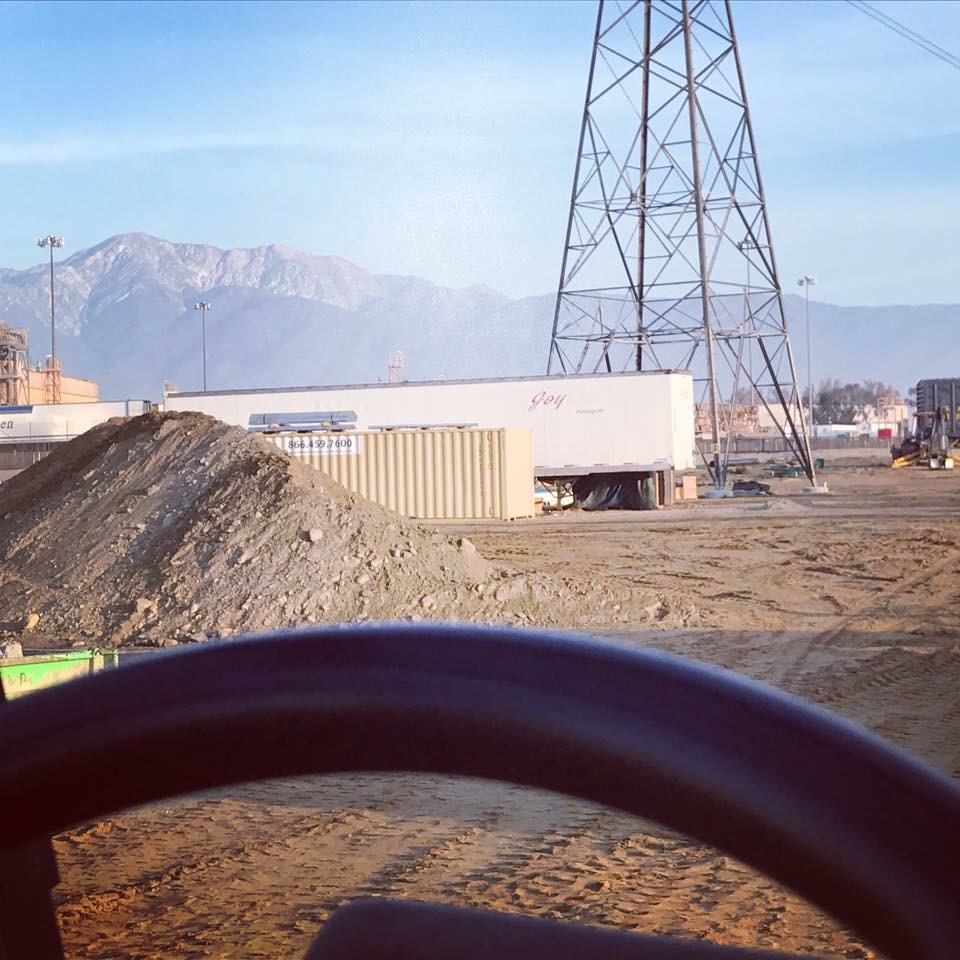 Construction site with mountains