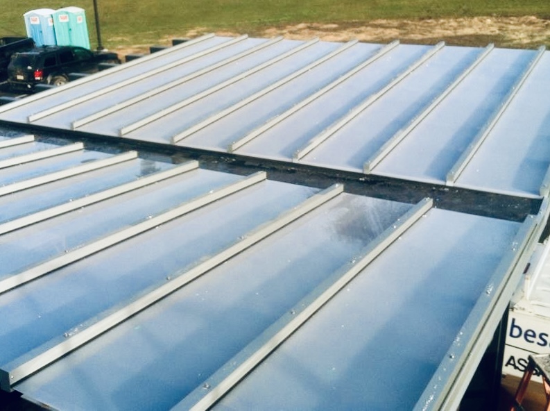 Metal panel roof installation