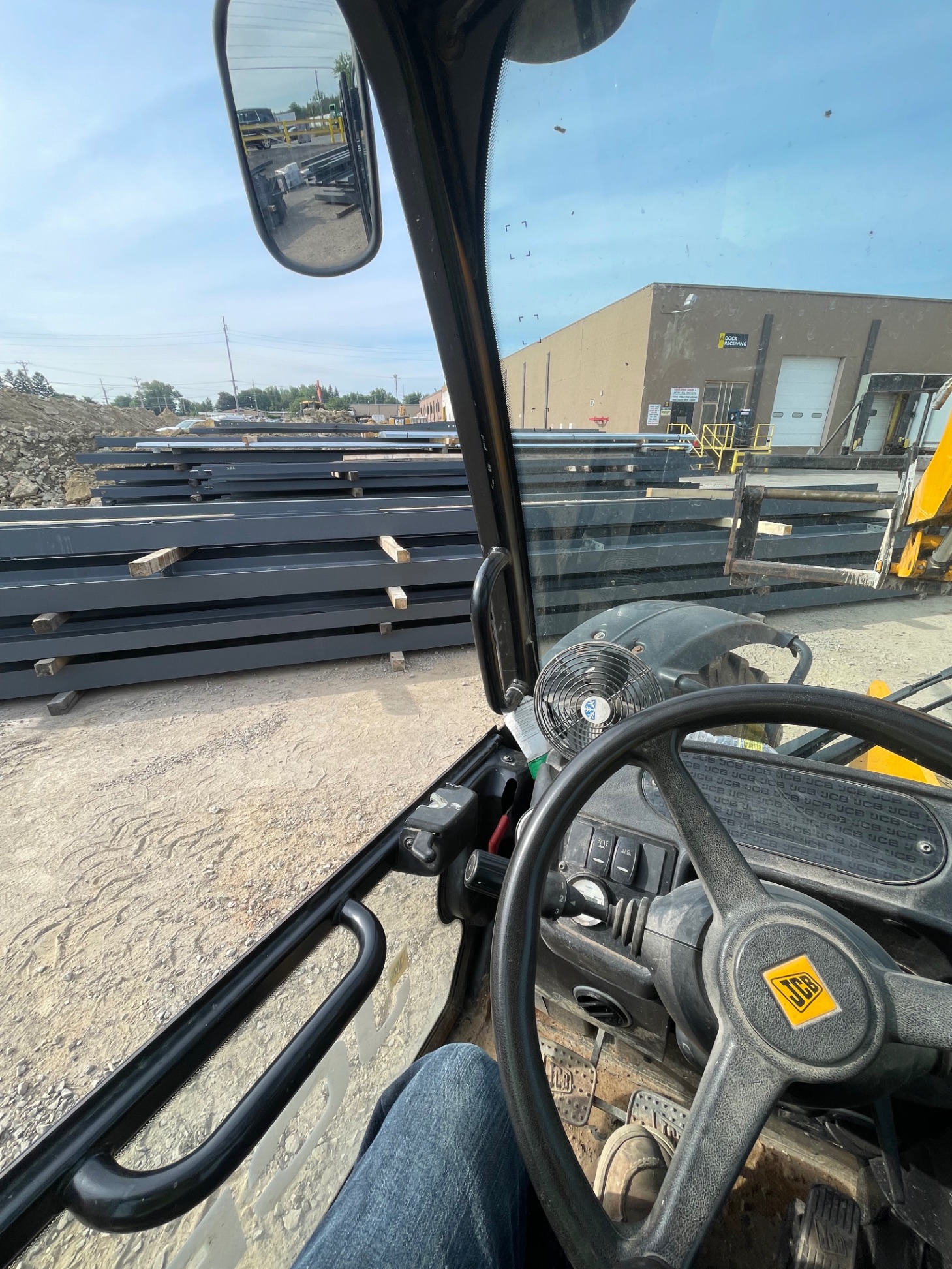 JCB telehandler on steel delivery site