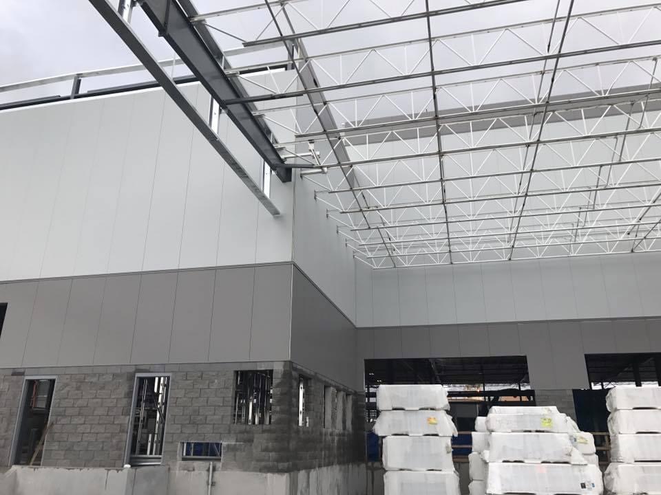 Large commercial build — IMP panels with open steel roof structure